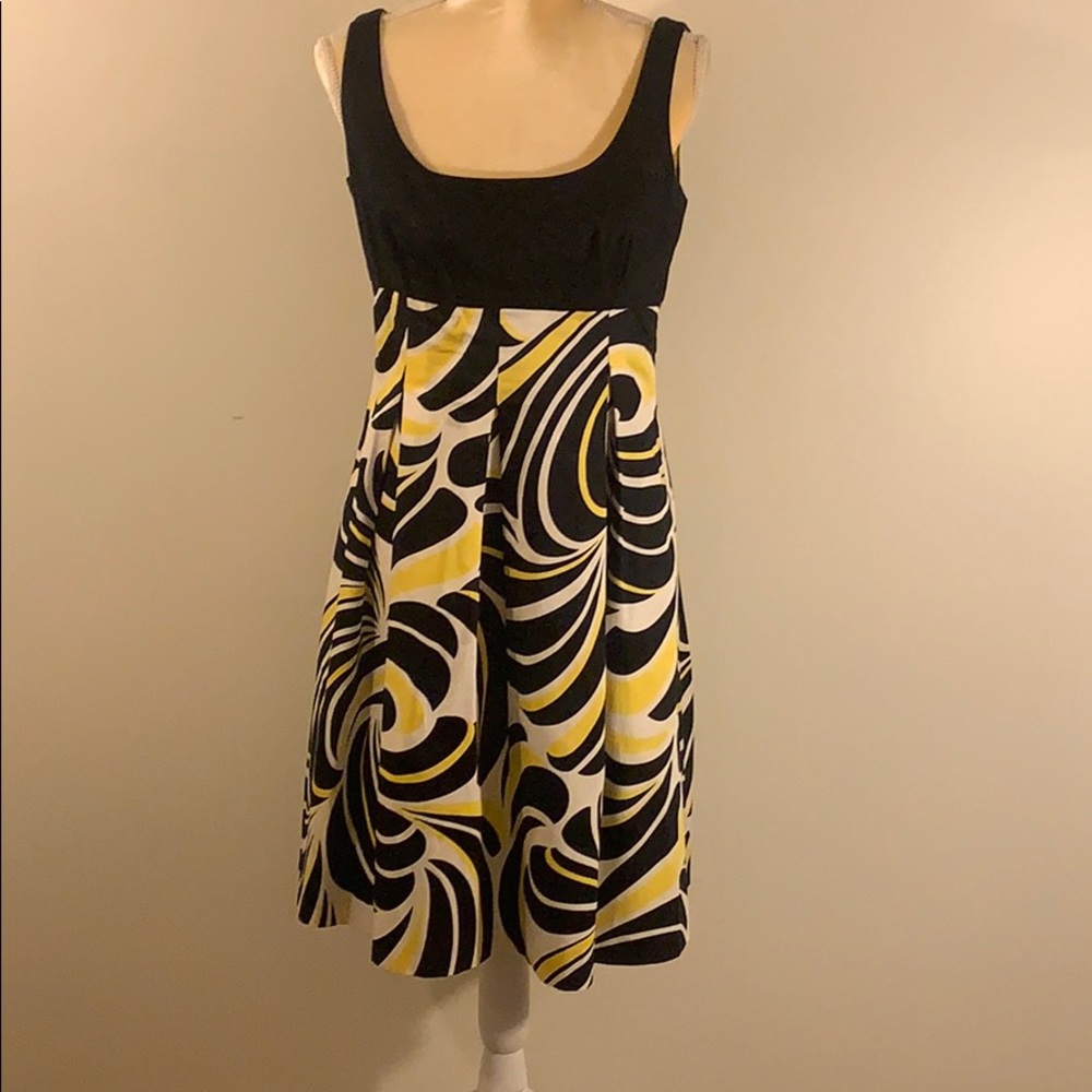 Black, yellow, and white dress